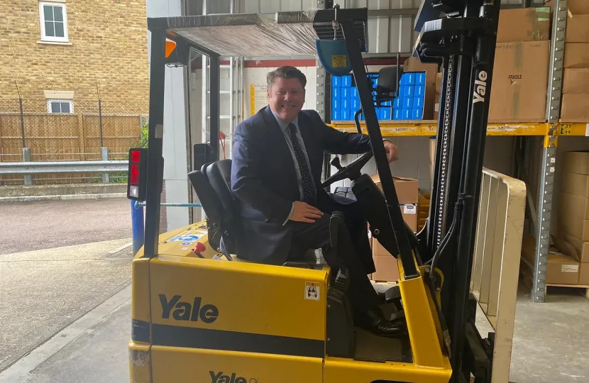 Dean Russell in a forklift