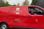 Dean Russell in an electric Post Office van