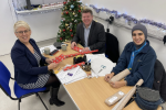 Dean Russell helps with Christmas wrapping